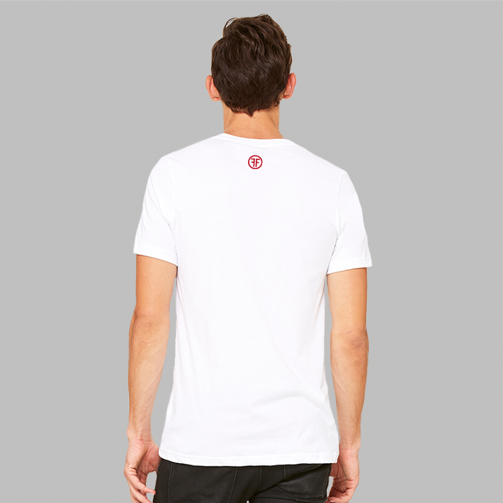 Back of a man wearing a white t-shirt with a red logo right below the collar line. The logo is two Fs, back to back, surrounded by a circle.