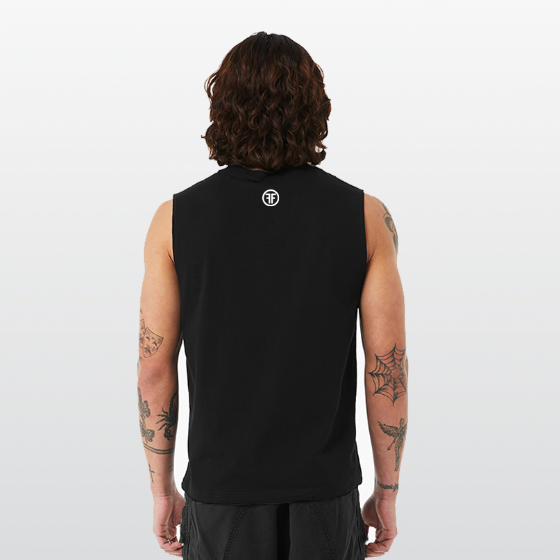 A man wearing a black muscle tank top with a white logo right below the collar. The logo has two Fs, back to back, outlined by a white circle.