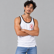 A man wearing a white tank top with black trim. Red left chest logo is round and has the text Fifty 50 at the top and Equality at the bottom with two Fs, back to back in the middle.
