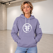 A woman wearing a lavender equality hoodie with a white equal sign on left arm, and the text, Fifty 50 Apparel is made for equality, no more, no less, just equal, on the right arm. Center chest logo has two Fs, back to back outlined by a circle.