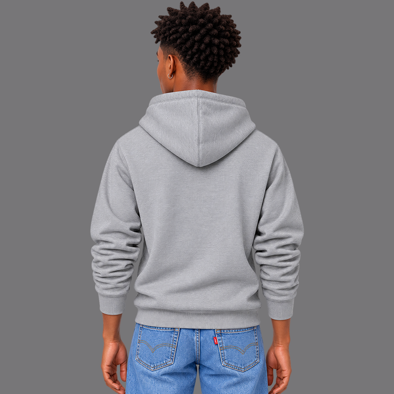 A man shown from the back wearing a light gray pullover hoodie showing the unisex fit and that there are no graphics on the back, paired with blue jeans against a solid gray studio background.