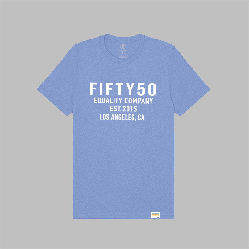 A heather blue short-sleeve t-shirt with white text reading 'FIFTY50 EQUALITY COMPANY EST.2015 LOS ANGELES, CA' on the front, shown flat against a solid gray background.