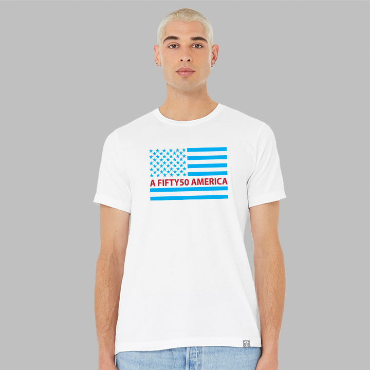 A man wearing a white t-shirt with a large American flag. The flag is in turquoise and red with the text, A Fifty50 America.