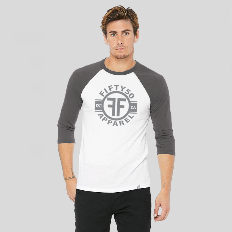 Man wearing a white baseball tee with grey arms and collar. The logo is in matching grey with the text, Fifty50 Apparel Est CA.