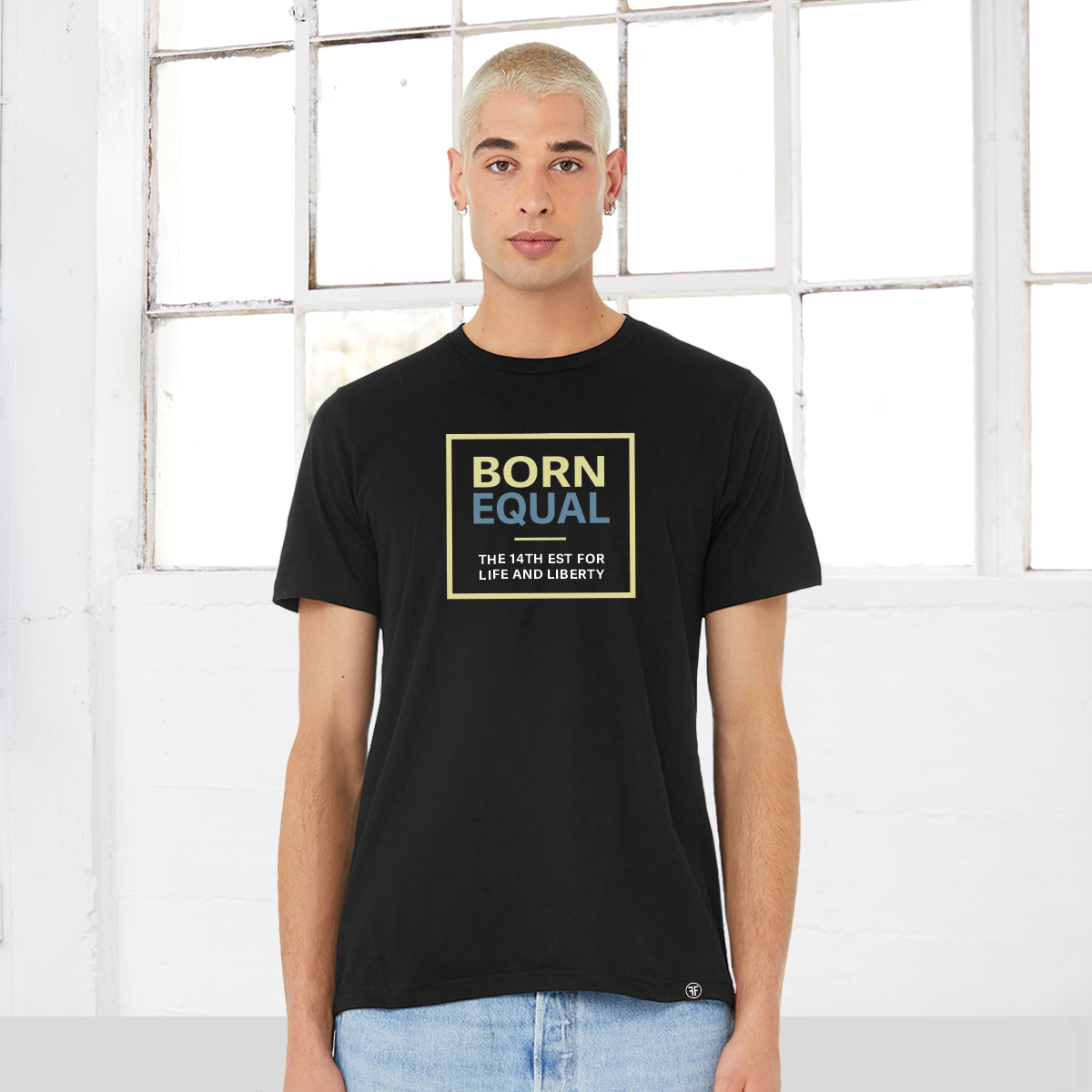Man wearing in a black equality t-shirt with a large, center chest logo. The text, Born, is in Bisque Gold, bold font, while Equal is in Slate Blue, bold font. Below that, The 14th Established for Life and Liberty is written in white, bold font.