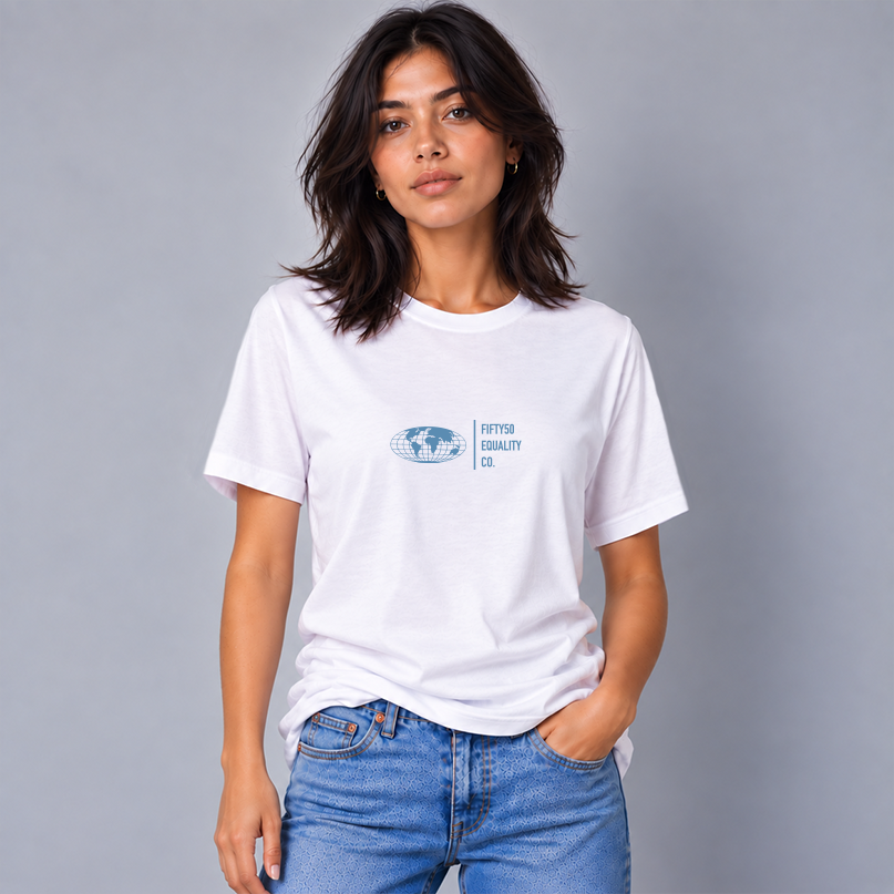 A man wearing a white short-sleeve t-shirt with a Slate Blue graphic center chest featuring a globe and the text 'FIFTY50 EQUALITY CO. Paired with jeans, set against a solid gray background.